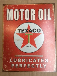 man cave texaco tin sign